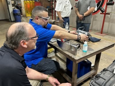 Field inspection team reviewing project requirements